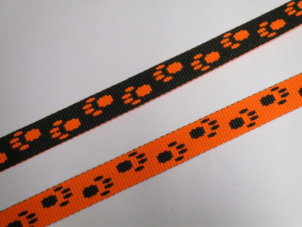 Popruh pomarančovo-čierny "ťapky" - 1,5 cm