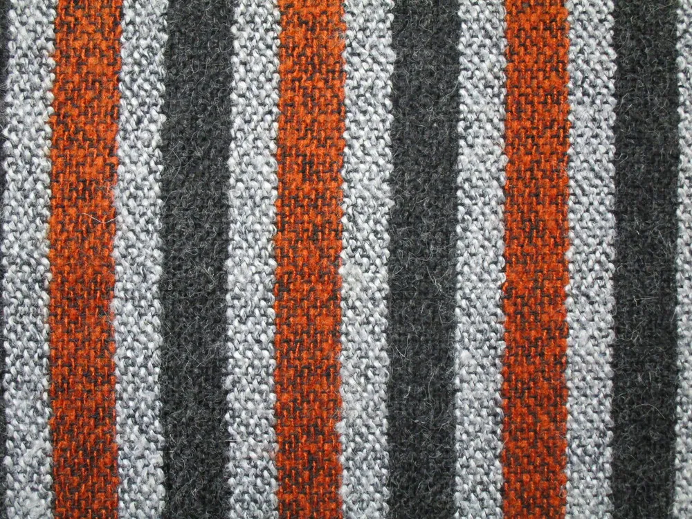 Kabátovina pomarančovo-sivo-čierna "pásiky"