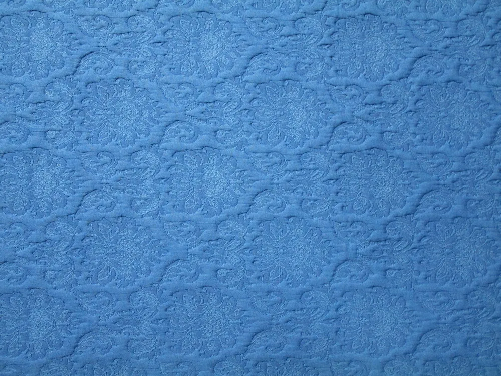 Žakard modrý "plastický modrý ornament"