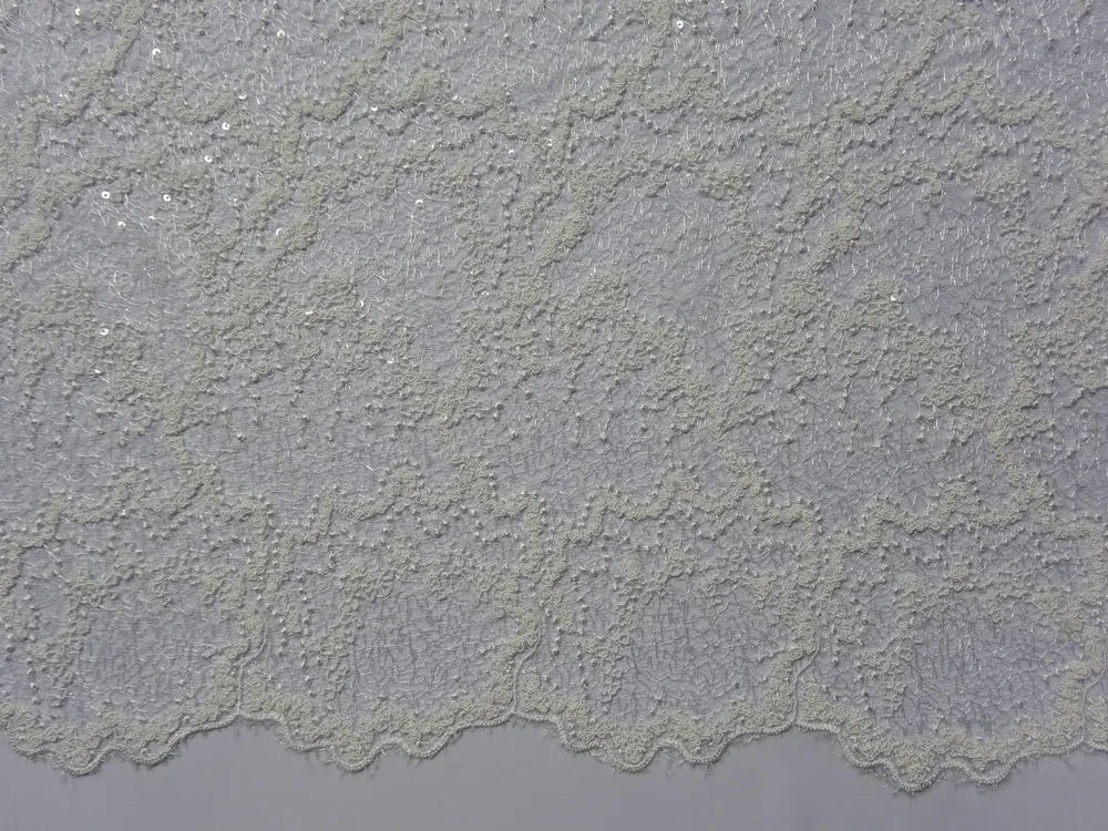 Krajka smotanová "vzorovaná, flitre" 