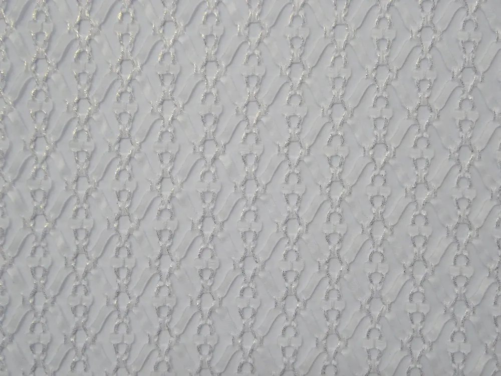 Krajka biela "vzorovaná, popretkávaná zlatou farbou"