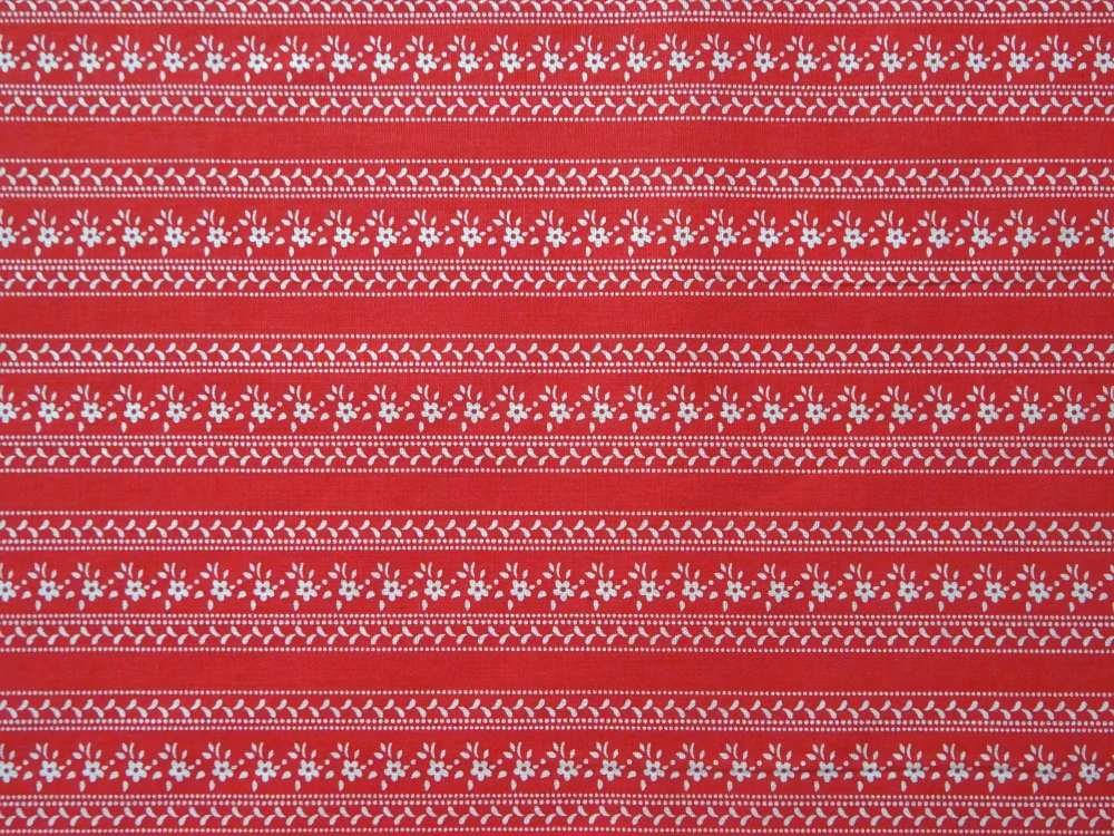 Bavlna červená "biely ľudový vzor" 