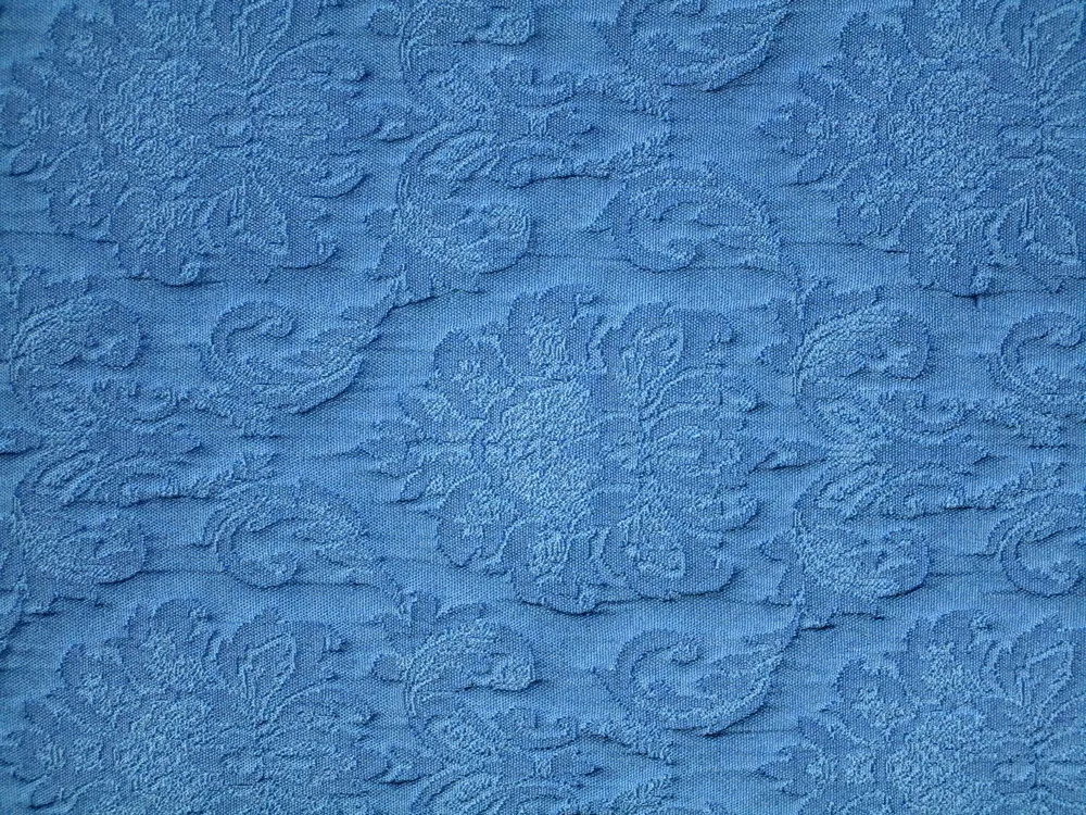 Žakard modrý "plastický modrý ornament"