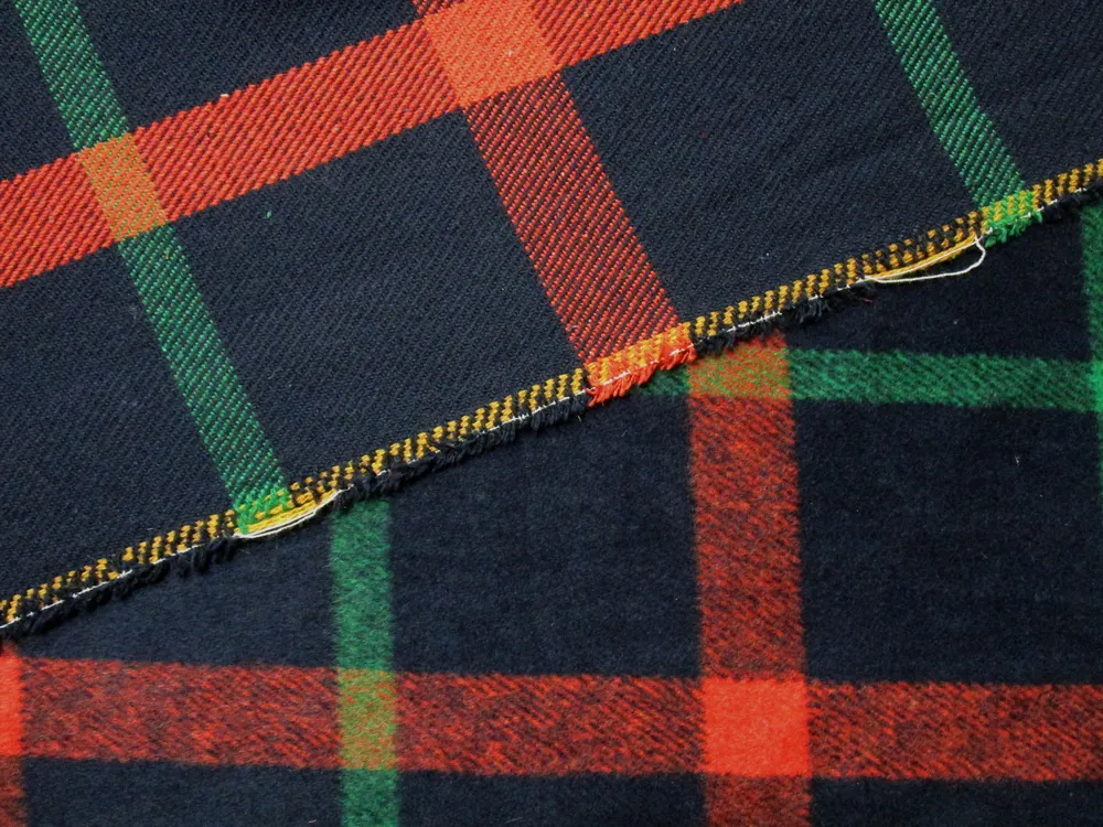 Kabátovina tmavomodrá "pomarančovo-zelené káro"