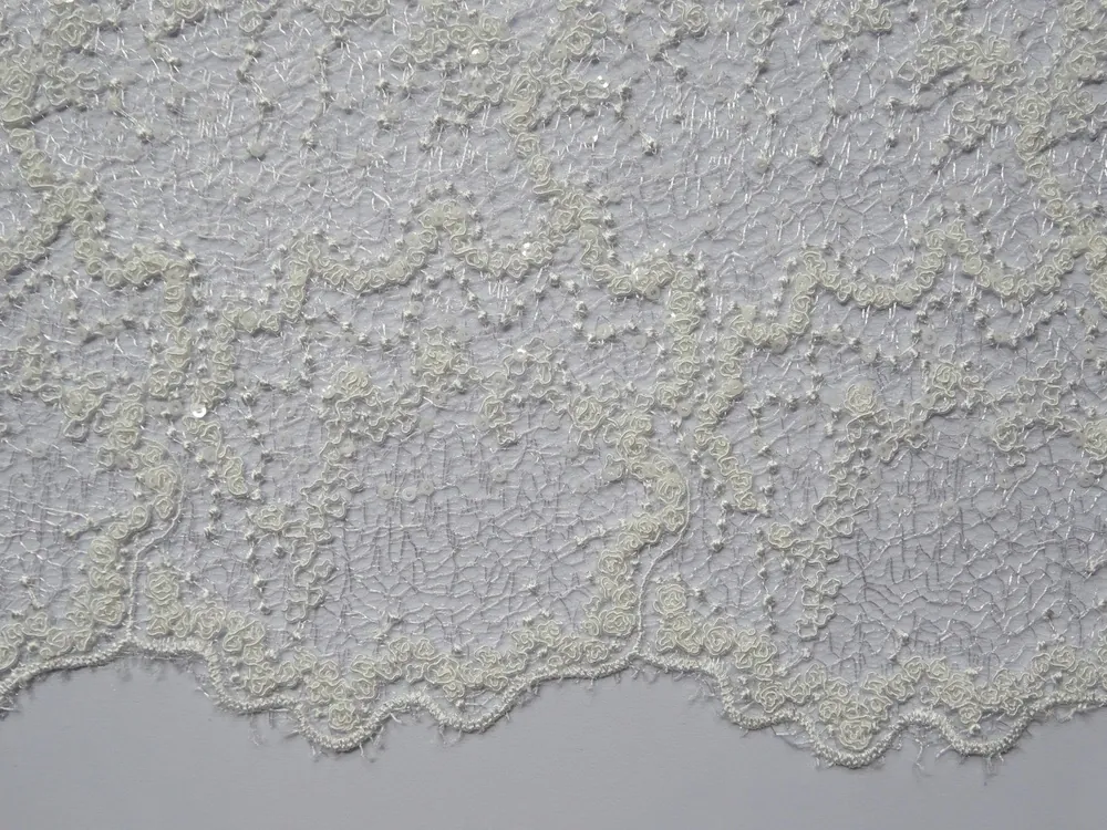 Krajka smotanová "vzorovaná, flitre" 