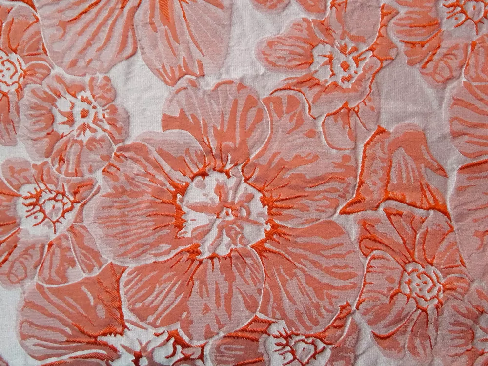Žakard svetlopomarančový "plastické kvety"