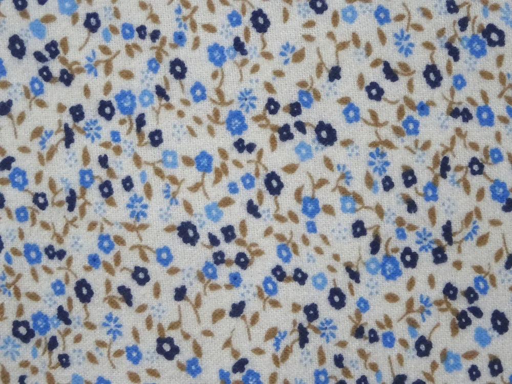 Flanel smotanový "modré kvety" 