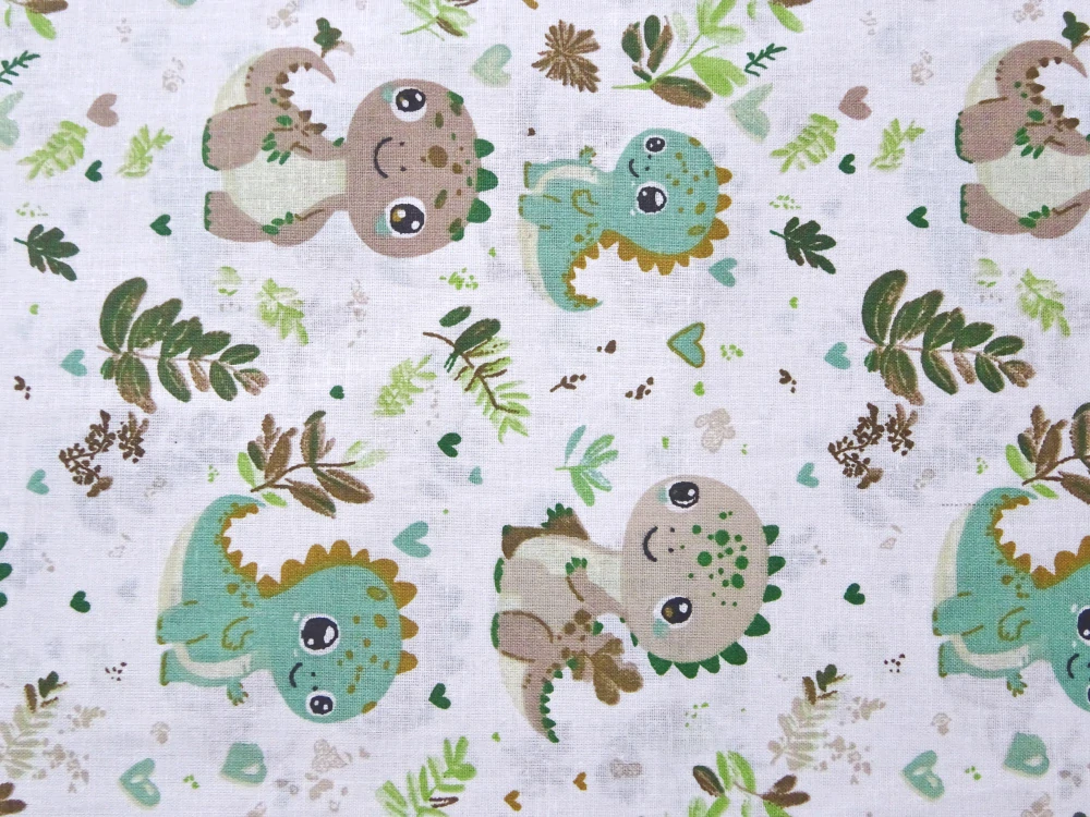 Bavlna biela "zelený a hnedý dinosaurus" 