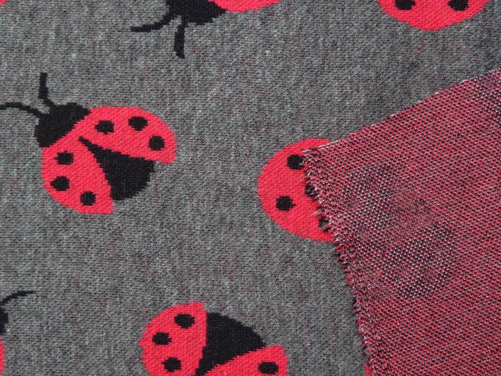 Svetrovina sivo-červená "lienka"