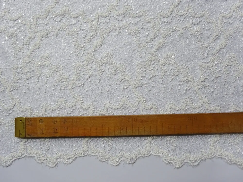 Krajka smotanová "vzorovaná, flitre" 