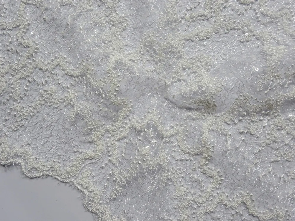 Krajka smotanová "vzorovaná, flitre" 