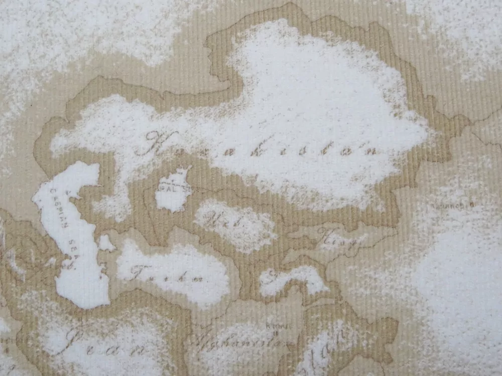 Menžester smotanový "kontinenty" - 2. akosť 