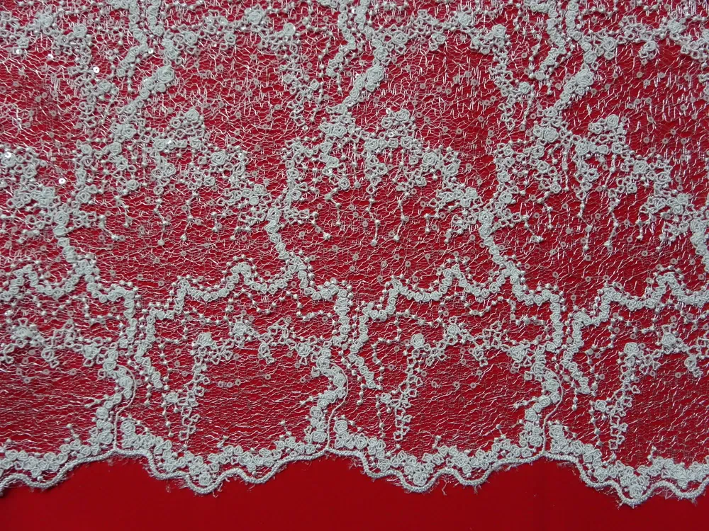 Krajka smotanová "vzorovaná, flitre" 