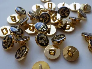 Gombík "zlatý symbol - šport" - 15 mm 