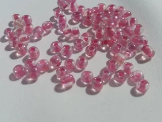 Korálik sklenený "ružový stred" - 4 mm - balík
