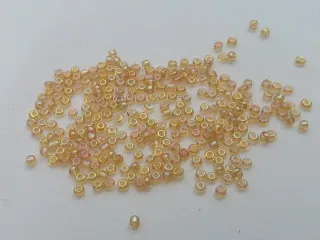 Korálik sklenený "pomarančovo-dúhový" - 2 mm - balík