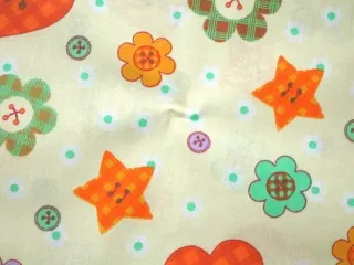 Bavlna svetložltá "gombíky"