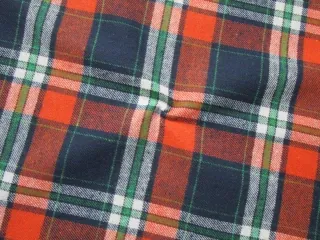 Flanel pomarančovo-tmavomodrý "bielo-zelené káro"