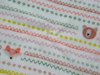 Fleece smotanový "zvieratká, cik-cak, kruh" - OEKO-TEX 
