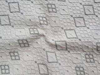 Žakard maslovo-sivý "geometrický vzor"